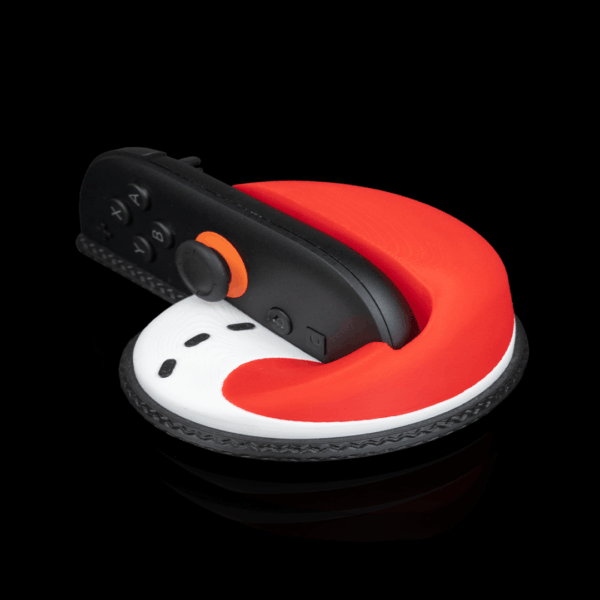 Soporte rojo y blanco para mando de videojuegos