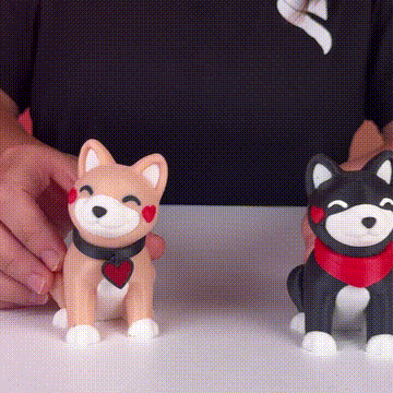 Muñecos de perritos sonrientes con corazones decorativos