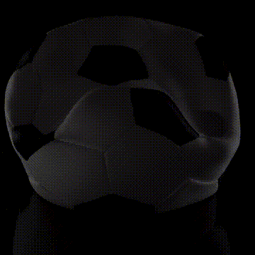 Balón de fútbol girando en fondo negro